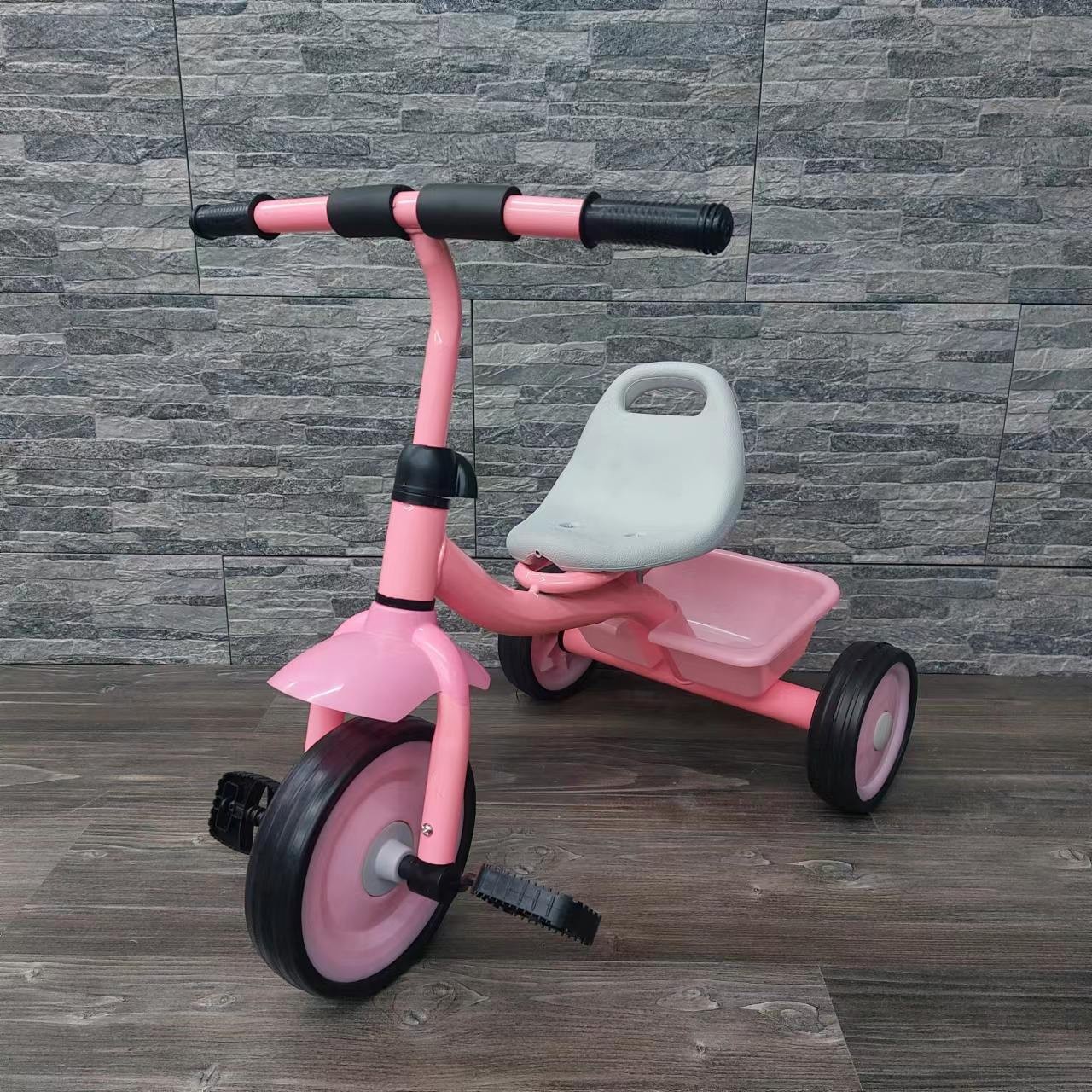 Baby tricycle with storage basket